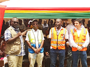 The scope of work for the road project includes the construction of drainage structures