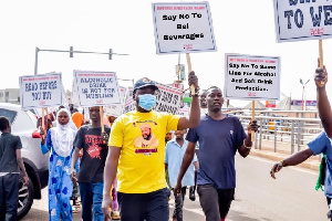 Muslim youth in Tamale holding placards in a demonstration