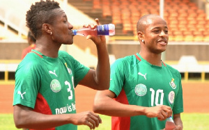 Asamoah Gyan and Dede Ayew