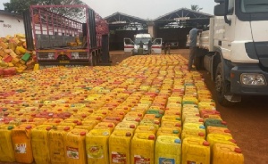 A search uncovered 1,115 gallons stuffed with cocoa beans