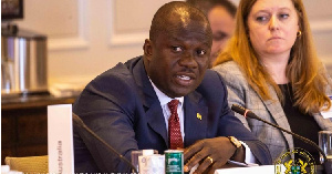 Minister for Lands and Natural Resources,  Samuel Abu Jinapor (left)