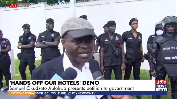 Martin Kpebu at the hands off protest