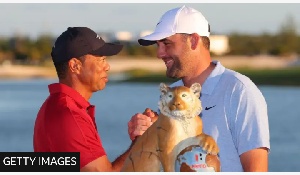 Scottie Scheffler (right) has won 42.9% of the 21 tournaments he has played in 2024