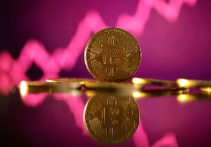 Bitcoin surpasses $98,000 as cryptocurrency market experiences mixed trends