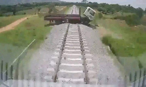 The Hyundai truck was left unattended on the railway line, leading to a collision with the train