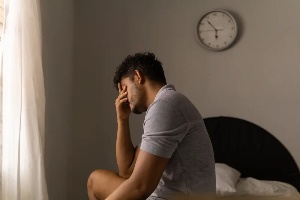 man unable to sleep