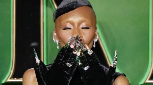 The designs evolved with Elphaba's character arc, using green ombré and foil techniques