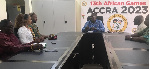 Asafa Powell with some GOC officials