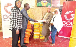Robert Kyere (2nd from left), the Public Relations Manager of GOIL, presented the items