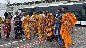 Black Stars players in Kente