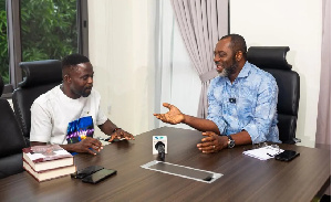 NAPO at a meeting with Manasseh Azure Awuni
