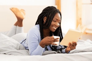 woman rreading in bed
