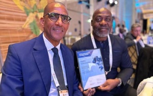 Mr. Tutu Agyare with the award