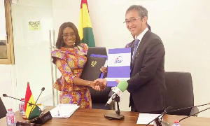 Finance Minister Abena Osei-Asare and JICA's Naoki Ando