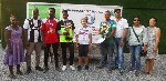 The winners displaying their trophies