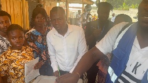 The said Manhyia South Presideing Officer in white