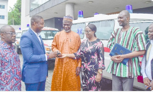 Bernard Okoe Boye presenting the keys to the water tank for the Tamale Teaching Hospital