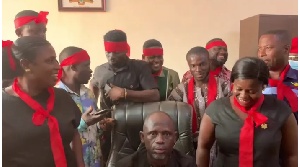 Protests followed, with assembly members wearing red bands at the municipal office