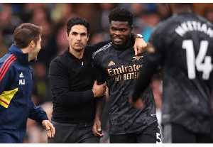 Mikel Arteta with Ghana midfielder Thomas Partey