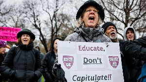 Protester against Trump federal fund cuts