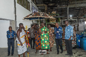 The  Akwamuhene, Odeneho Kwafo Akoto III (in green) toured the company on Feb 26