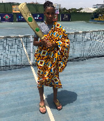 Akua Hansen with the trophy she won