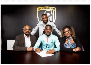 A picture of Daniel Adu-Adjei with his family