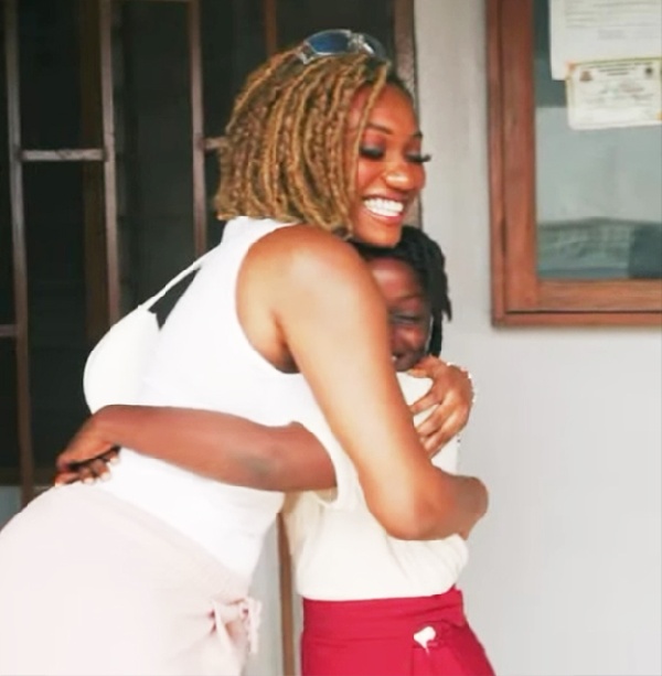 Wendy Shay hugs Tracy Shay.