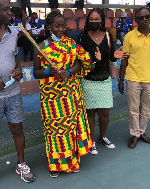 Grace Nyanyuie Tomegah with her award for winning the tourney