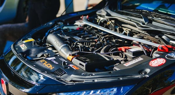 photo-of-car-parts-and-engine