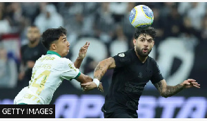 Corinthians forward Yuri Alberto (right) kicked the pig's head off the pitch