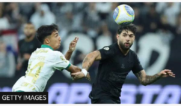 Corinthians forward Yuri Alberto (right) kicked the pig's head off the pitch