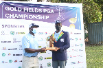 Torgah receiving his trophy