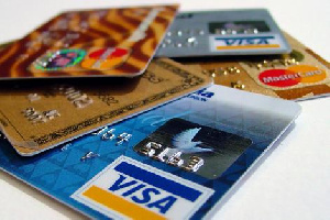 Credit card balances and delinquencies continue to grow, albeit slower