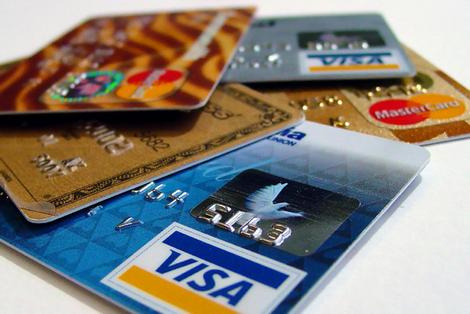 Credit card balances and delinquencies continue to grow, albeit slower