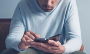 man texting