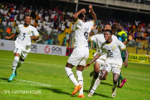 Michael Ephson and his teammates celebrating the winning goal