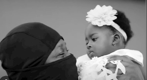 Medikal with his daughter