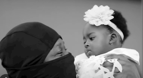 Medikal with his daughter