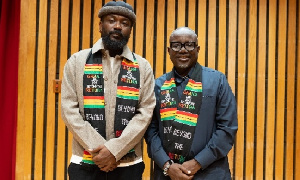 Samini in a pose with boss of Ghana Tourism Authority