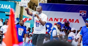 Dr. Amin Adam speaking at a rally in Saboba