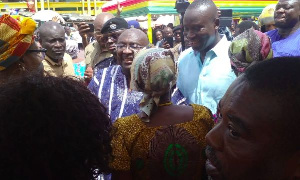 Bawumia interacting with the Madina Market women during his visit