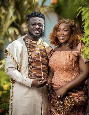 Perez Musik and his wife