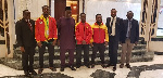 Some of the weightlifters with the President and other Executives of the Federation