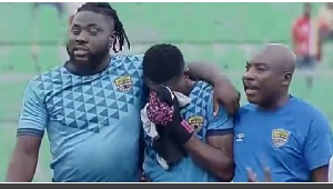Richard Attah (on the left) consoling his teammate Richmond Ayi