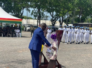 Dominic Nitiwul laying wreath