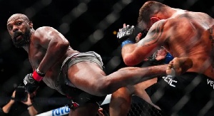 Jon Jones kicks Stipe Miocic