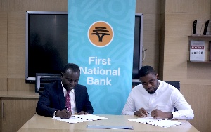 Kojo Addo-Kufuor, Executive Head of Home Loans Business at First National Bank signing the agreement