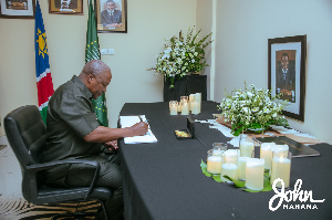 John Dramani Mahama signing the book of condolence