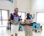 Charles  Baiden receiving his trophy